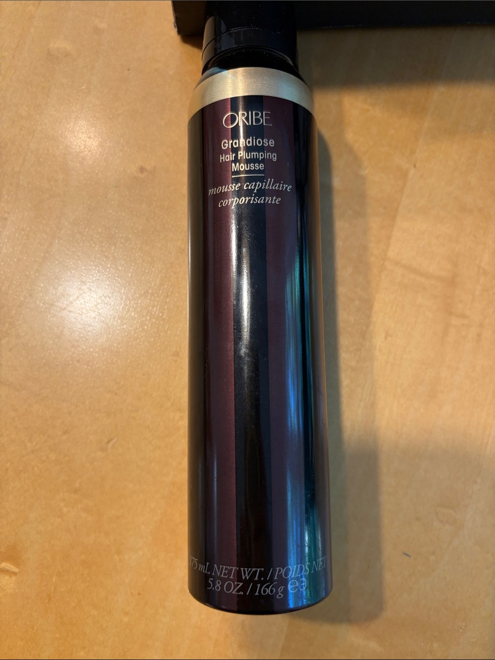 Oribe Grandiose Hair Plumping Mousse. 5.8 ounces. Used once